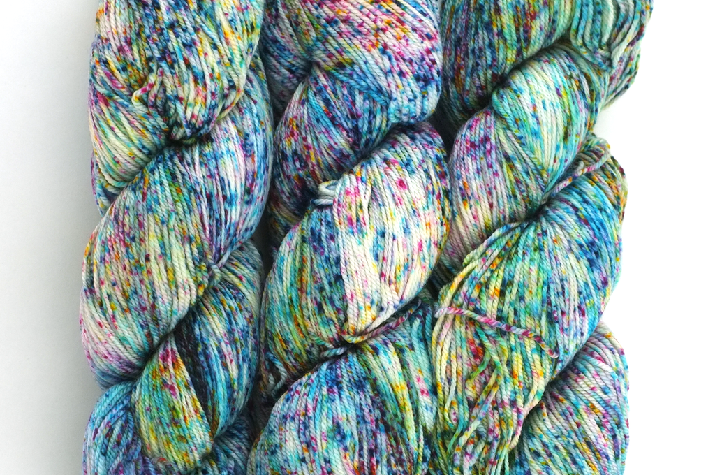 Malabrigo Sock in color Parade, Fingering Weight Merino Wool Knitting Yarn, speckle dyed on turquoise, #732 - Purple Sage Yarns
