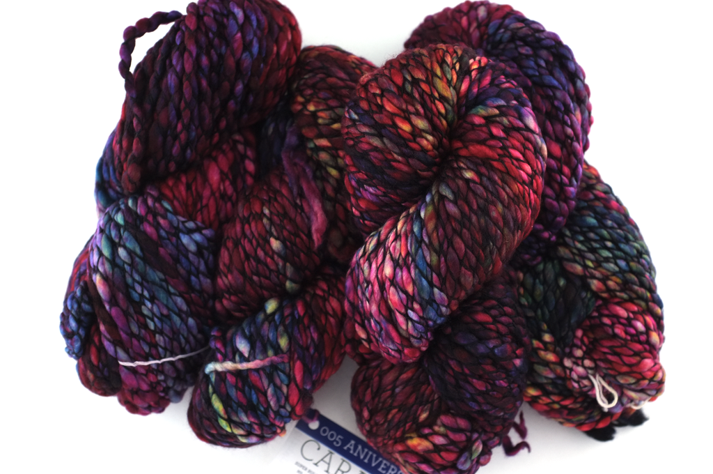 Malabrigo Caracol in color Aniversario, #005, Super Bulky thick and thin superwash merino knitting yarn in rainbow shades from Purple Sage Yarns