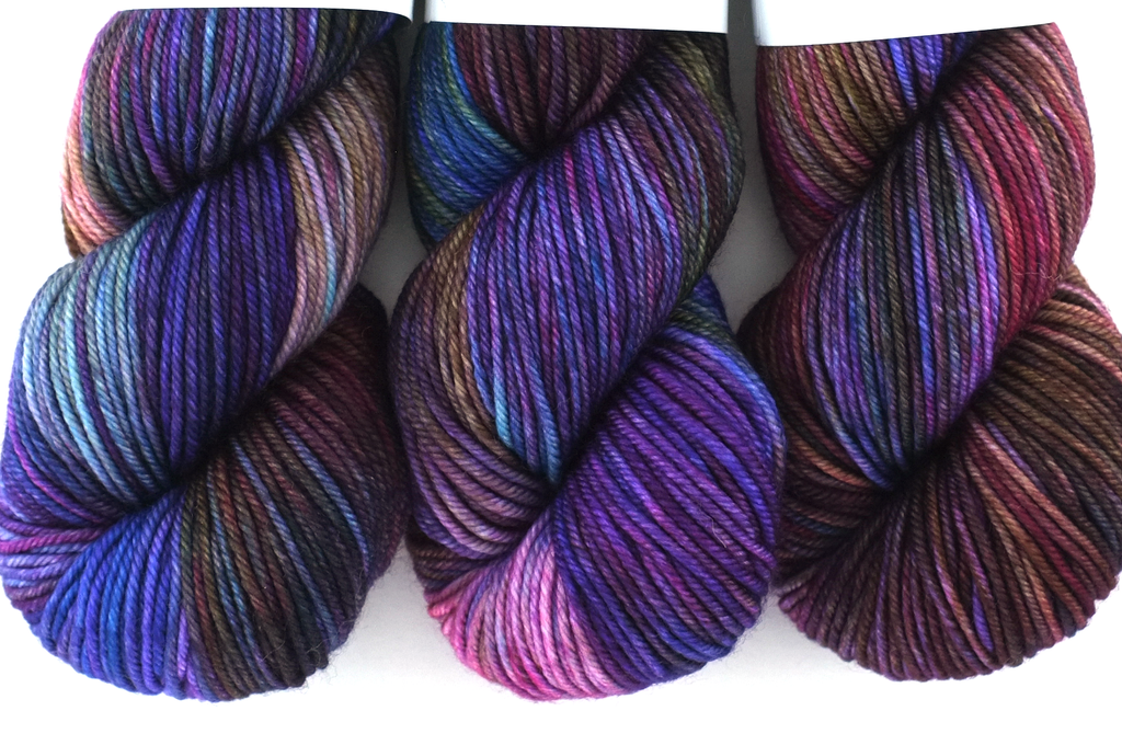 Dream in Color City in color My Fair Lady 910, aran weight superwash wool knitting yarn, purple, brown, blue, pink from Purple Sage Yarns