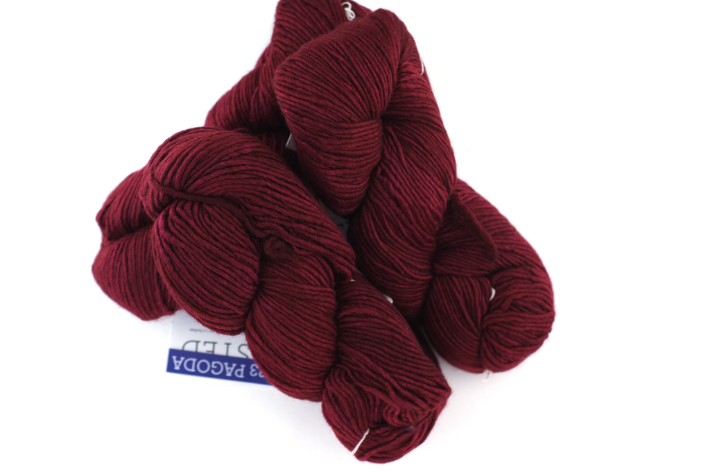 Malabrigo Worsted in color Pagoda, #023, Merino Wool Aran Weight Knitting Yarn, dark red