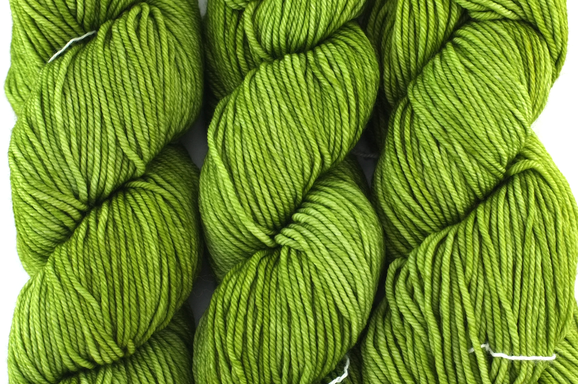 Malabrigo Rios yarn, color Lettuce, bright lettuce green, #037, superwash merino worsted weight knitting yarn from Purple Sage Yarns