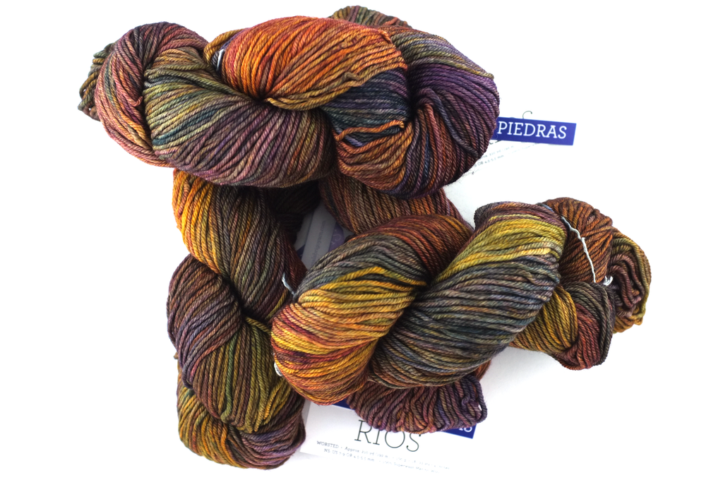 Malabrigo Rios in color Piedras, Worsted Weight Superwash Merino Wool Knitting Yarn, rust, sunset, purple, #862 from Purple Sage Yarns