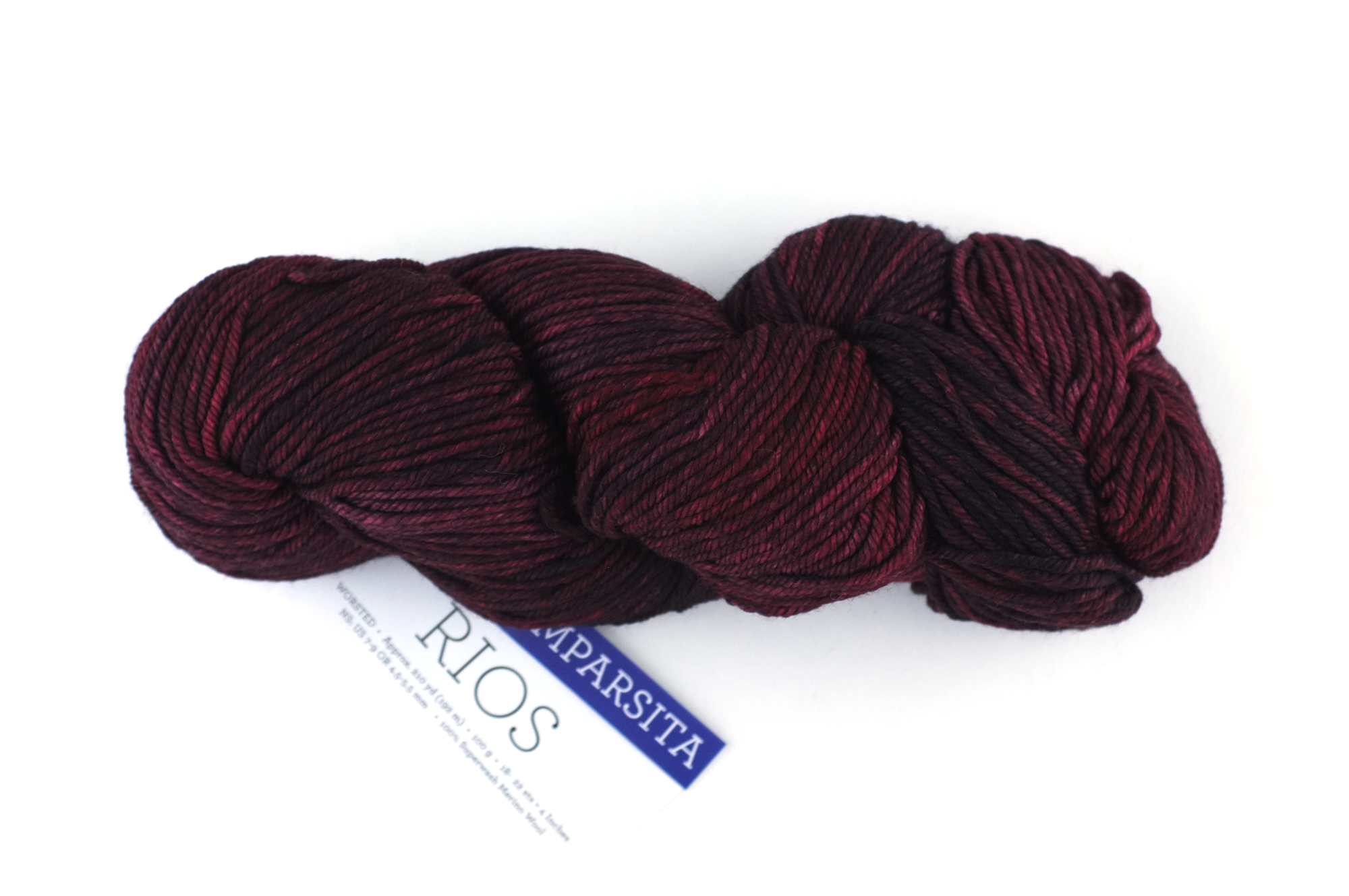 Malabrigo Rios in color Cumparsita, merino wool worsted weight knitting yarn, dark reds, #869