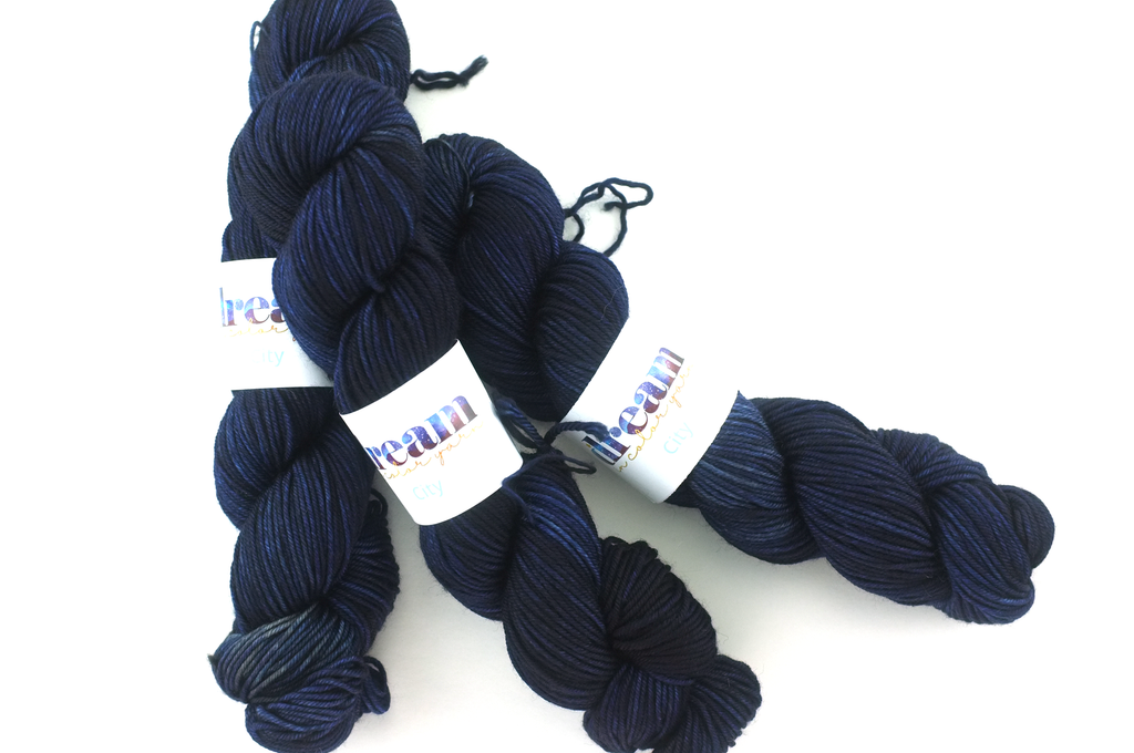 Dream in Color City in color Indigo 724, aran weight superwash wool knitting yarn, indigo blue shades from Purple Sage Yarns