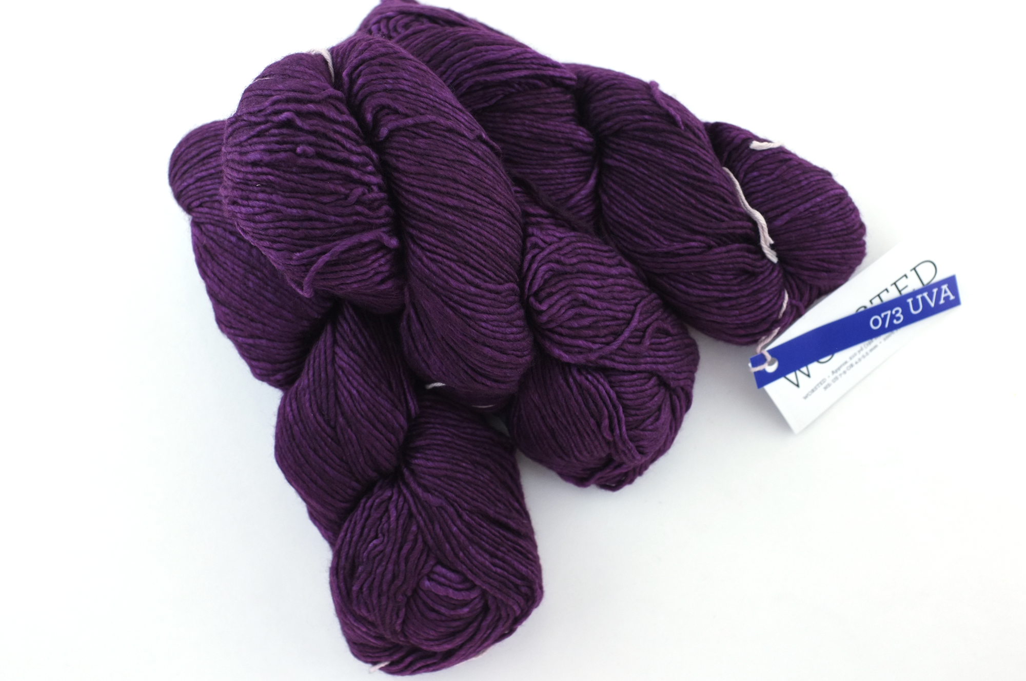 Malabrigo Worsted in color Uva, Merino Wool Aran Weight Knitting Yarn, dark grape purple, #073 - Purple Sage Yarns