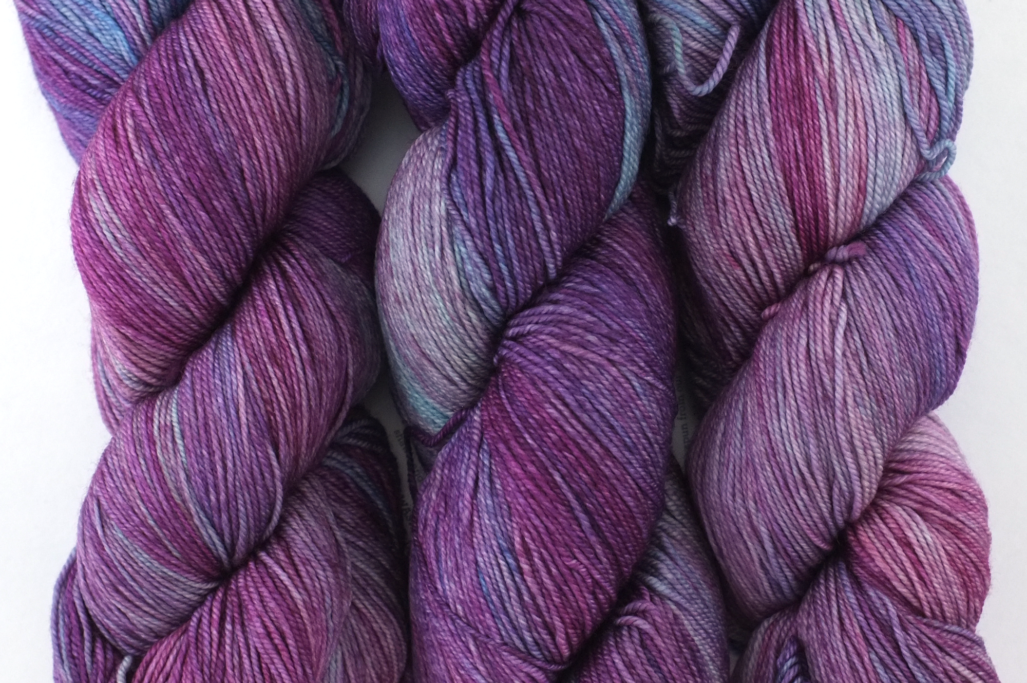 Malabrigo Sock in color Lotus, Fingering Weight Merino Wool Knitting Yarn, crimson, blues, #120 - Purple Sage Yarns